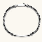 Alternate angle of the antique silver plated eco-brass foxtail chain bracelet with Greek key engraved bar.
