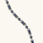 Close-up of the oxidized silver stainless steel gothic-baroque chain necklace with navy CZ stones.