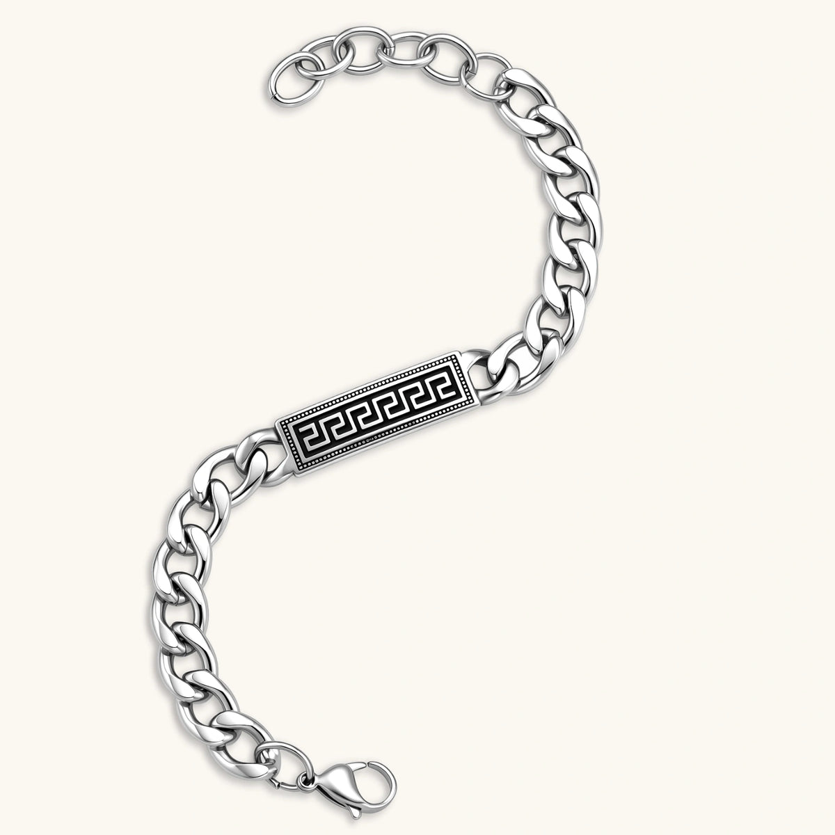 Detail view of the stainless steel curb chain ID bracelet with Greek key meander plate.