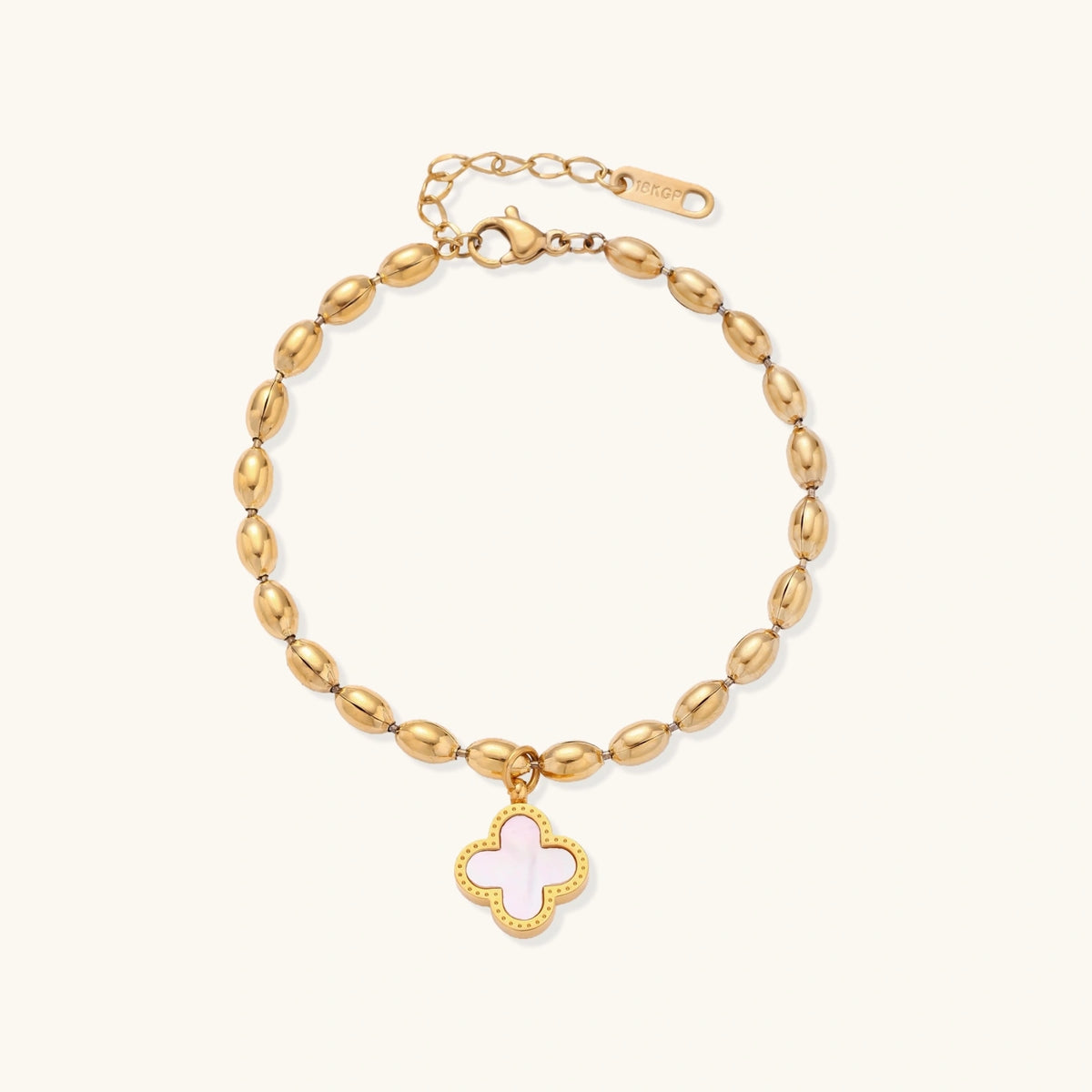 Front view of the 18K gold-plated beaded bracelet with a four-leaf clover charm in mother-of-pearl or black enamel.