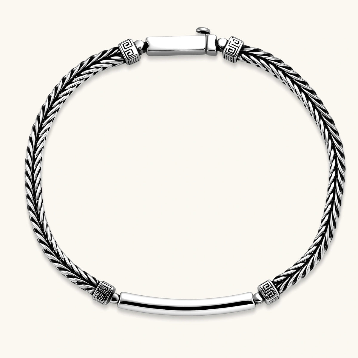 Alternate angle of the antique silver plated eco-brass foxtail chain bracelet with Greek key engraved bar.