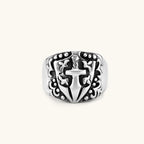 Additional angle of the stainless steel signet ring with raised knight shield and cross motif.