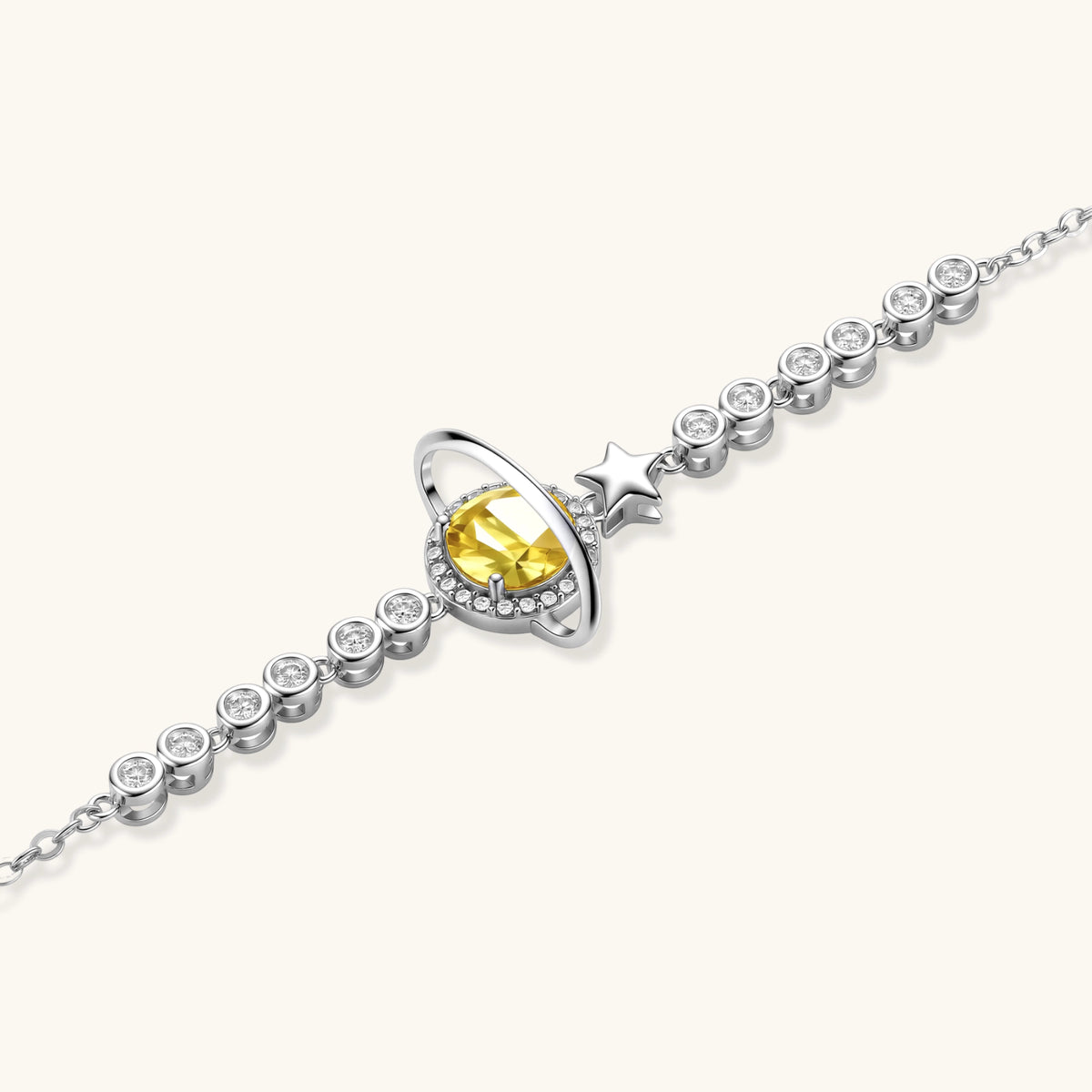 Additional angle of the sterling silver bracelet with a yellow moissanite stone and a star charm.