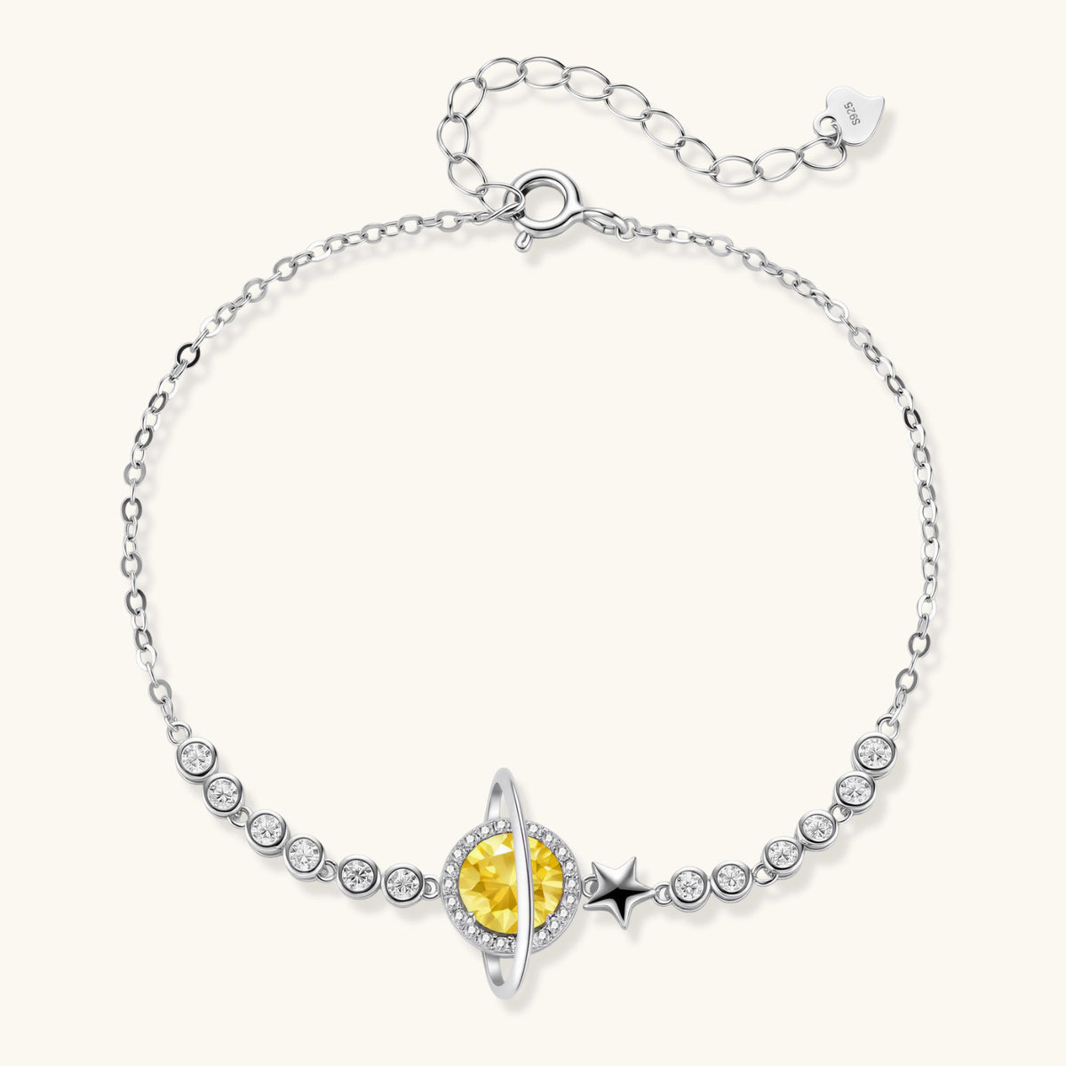 Front view of the sterling silver bracelet with a yellow moissanite stone and a star charm.