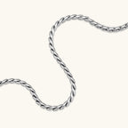 Close-up of the stainless steel twisted rope chain necklace.